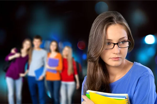 Jonge vrouwelijke student met boeken — Stockfoto