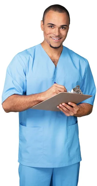 Medico tenendo appunti — Foto Stock