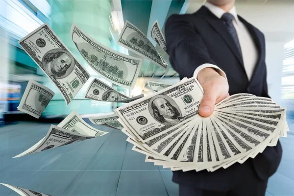 Business man holding money — Stock Photo, Image