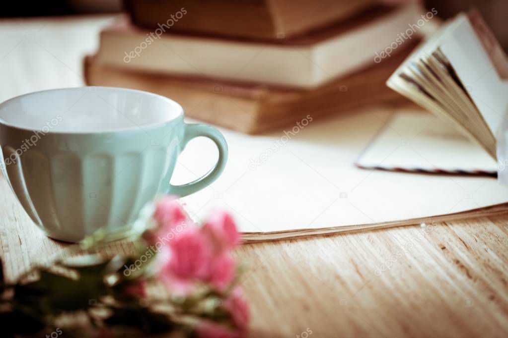 ceramic cups and old books