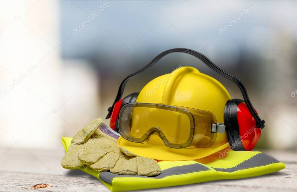 safety helmet with earphones and goggles