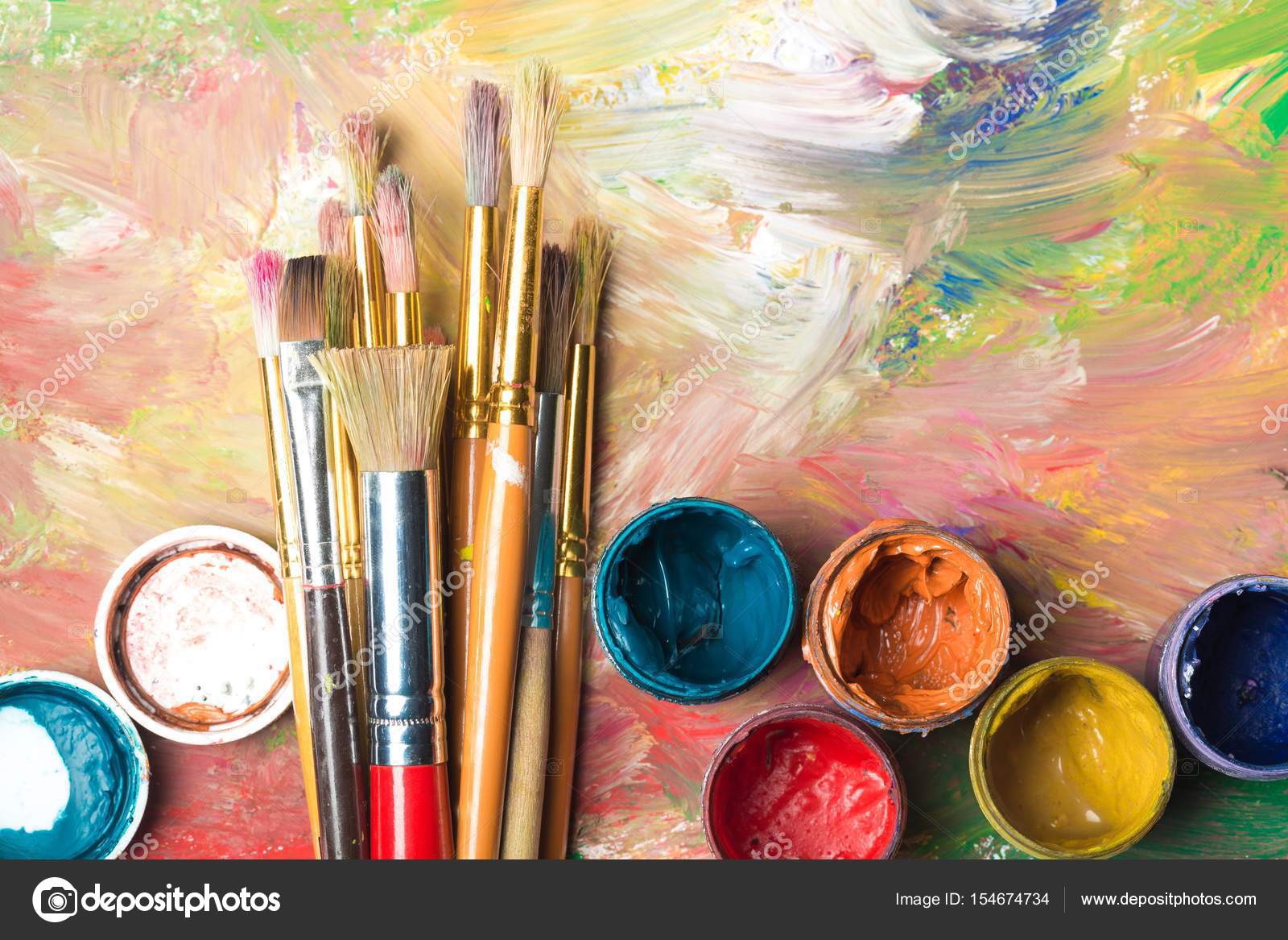 Artist paint brushes and paint cans Stock Photo by ©billiondigital 154674734