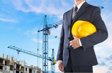 Architect holding hardhat