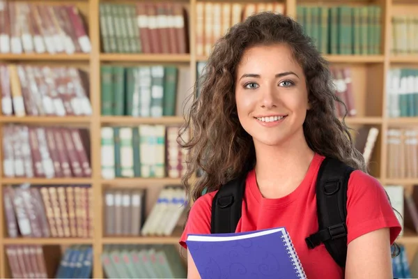 beautiful female student in library