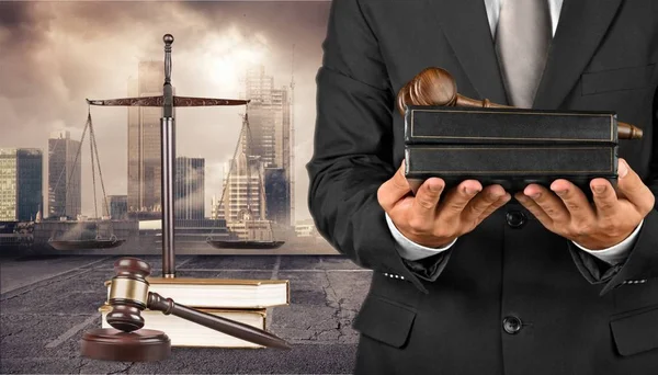 Business man holding books — Stock Photo, Image