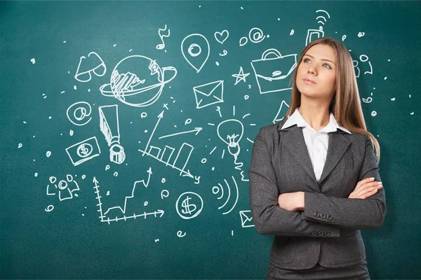 Young businesswoman with doodle icons — Stock Photo, Image