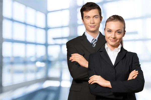 Business couple in black suits — Stock Photo, Image