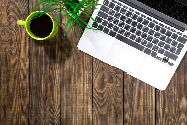 Laptop and coffee cup — Stock Photo, Image