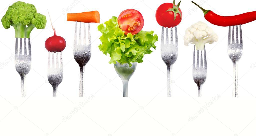 Fresh raw vegetables on forks