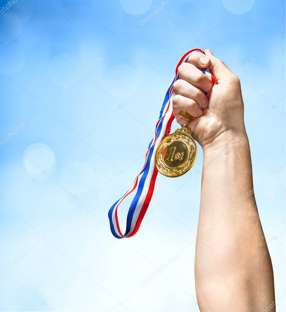 Gold medal with  ribbon 