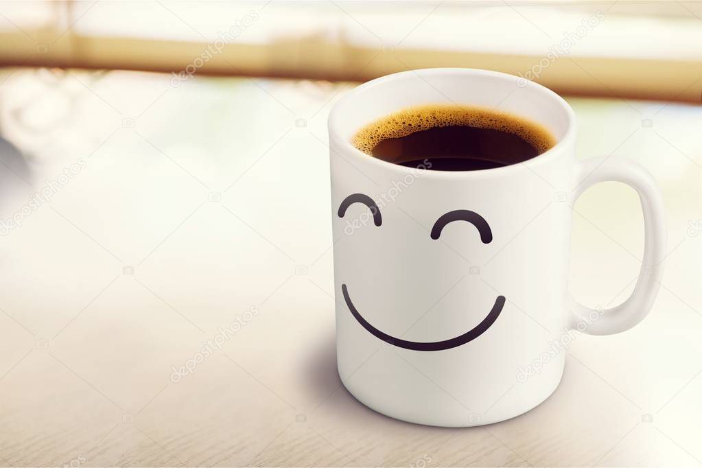 cup of hot coffee with smile