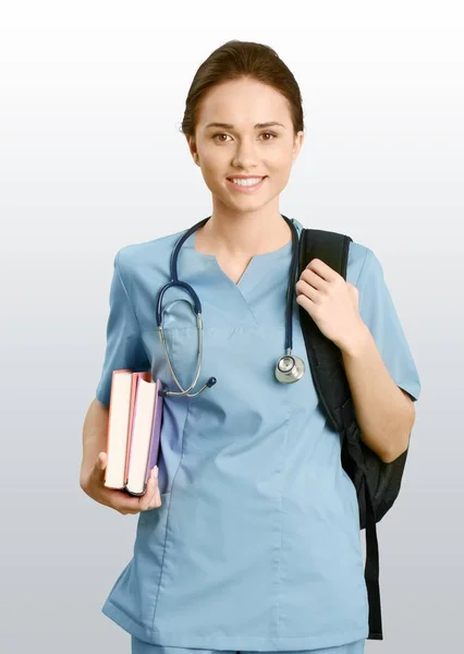 Mujer doctora con libros — Foto de Stock