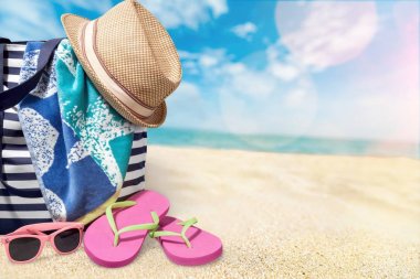 kumlu sahil şapka ile çanta 