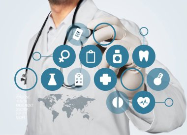 Doktor steteskop tutuyor. 