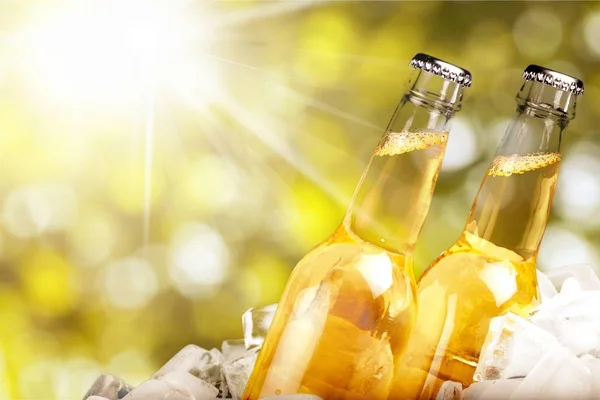 Bottles of beer in ice — Stock Photo, Image