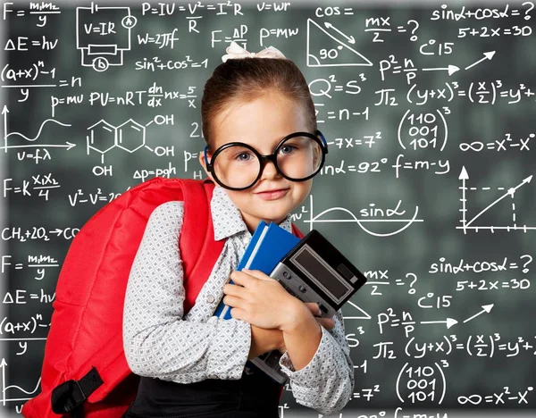 Girl in glasses with backpack — Stock Photo, Image