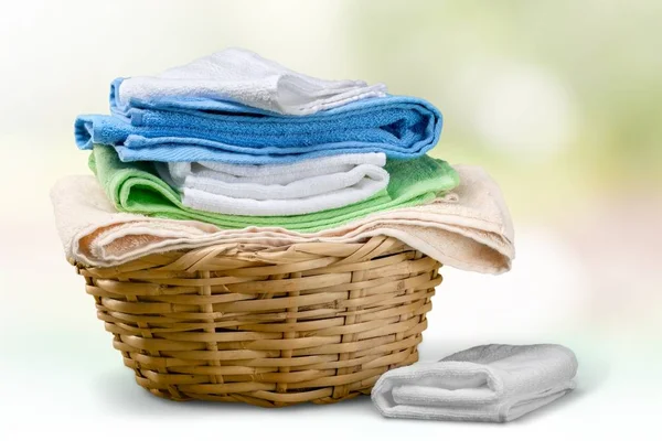 Laundry Basket with colorful towels