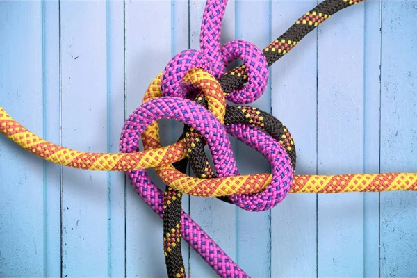 Knot on a colorful cord — Stock Photo, Image