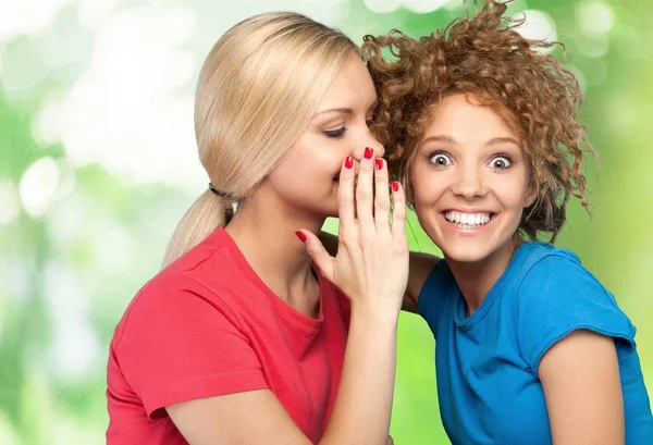 Woman revealing secret to friend — Stock Photo, Image