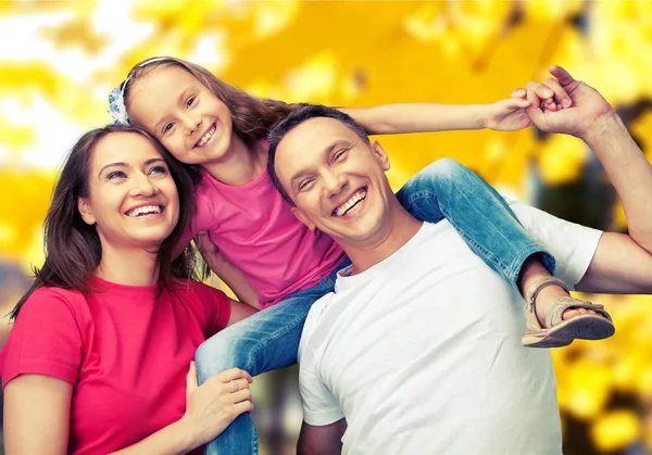 Happy smiling family with daughter — Stock Photo, Image