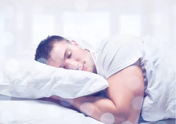 Спящий молодой человек — стоковое фото