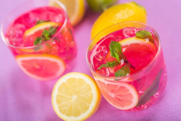 Glasses of grapefruit cocktail — Stock Photo, Image