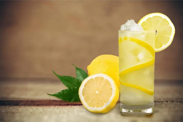 Glass of cocktails with lemon — Stock Photo, Image