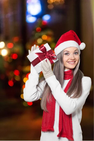 Mooie vrouw in santa hoed — Stockfoto