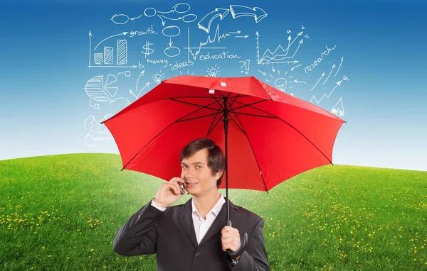 happy businessman with umbrella