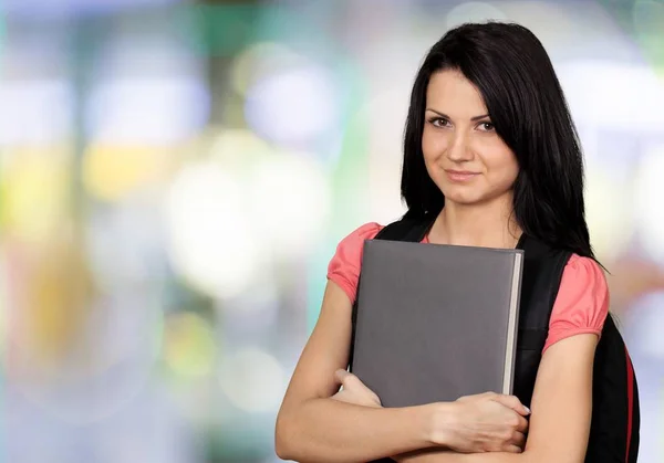 Young female student with book — Stock Photo, Image