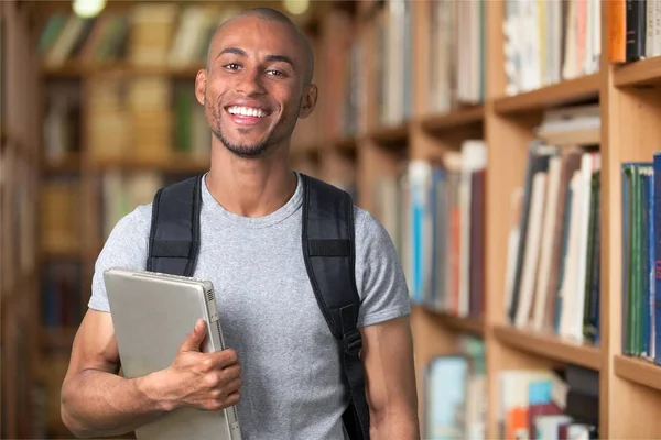 Student man med laptop — Stockfoto