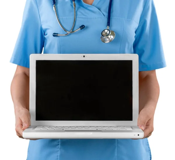Medico con stetoscopio che mostra laptop — Foto Stock