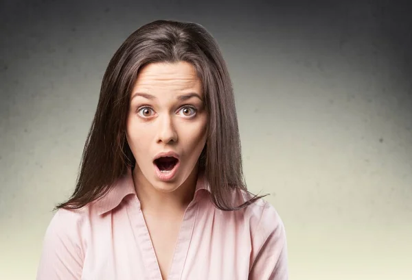 Surprised brunette woman — Stock Photo, Image