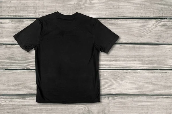 Bovenaanzicht van zwart T-Shirt — Stockfoto