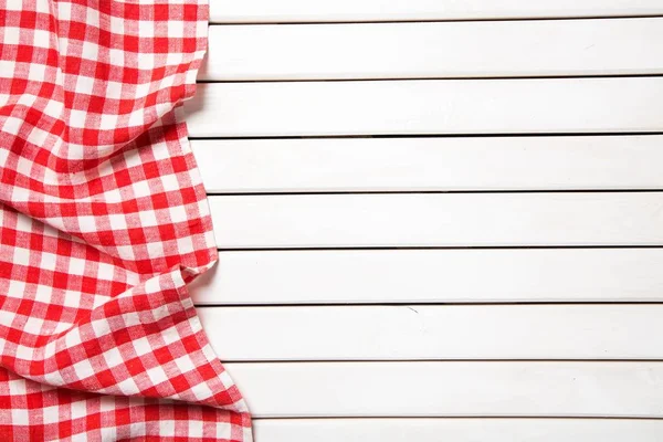 Tablecloth textile on wooden table — Stock Photo, Image