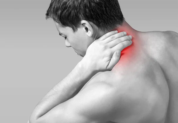 Strong man with neck pain — Stock Photo, Image