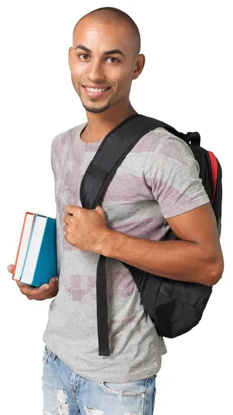 Man met boeken en rugzak — Stockfoto