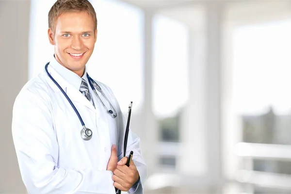 Handsome doctor with stethoscope — Stock Photo, Image