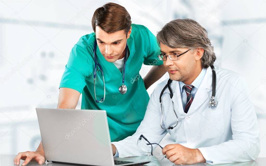 doctors using laptop