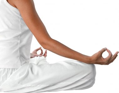 Yoga yaparken genç güzel kadın