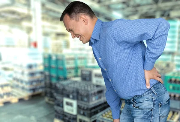 Hombre sintiendo dolor en la espalda —  Fotos de Stock