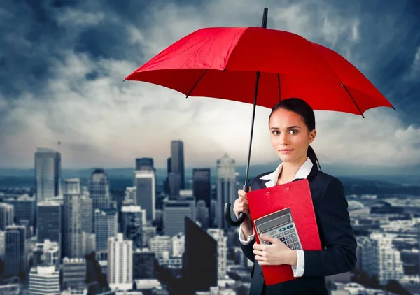 Young businesswoman with red umbrella — Stock Photo, Image