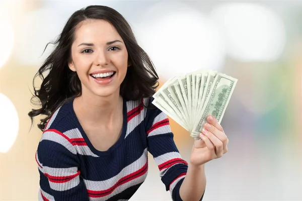 Mujer joven en posesión de billetes — Foto de Stock