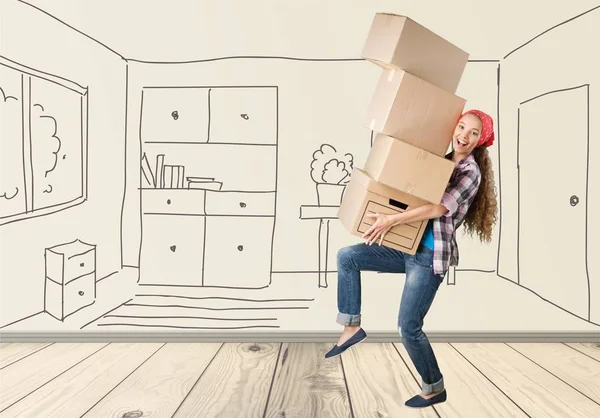 Mujer mudándose a casa nueva —  Fotos de Stock