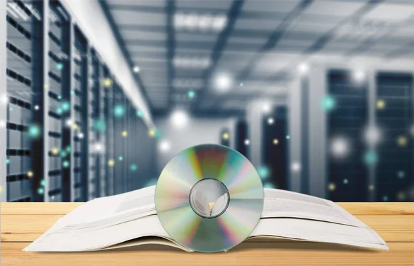 Sd disk and book — Stock Photo, Image