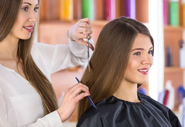 Woman having a haircut with scissors — Stock Photo, Image