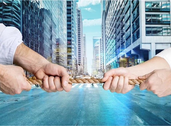Business men hands holding rope — Stock Photo, Image