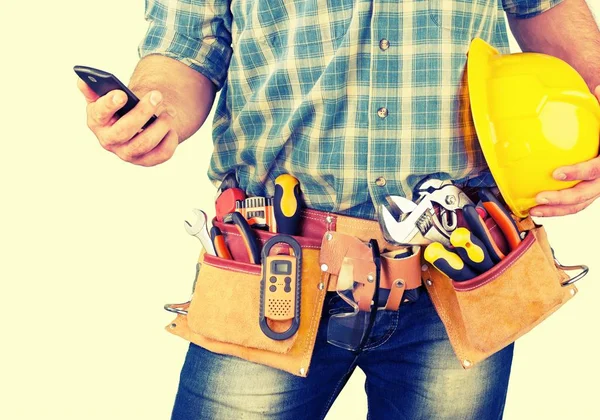 Male worker with tool belt — Stock Photo, Image