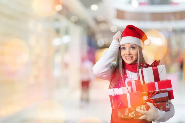 Young girl with christmas gifts — Stock Photo, Image