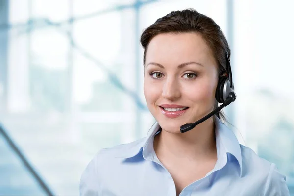 Young female call center employee Stock Image